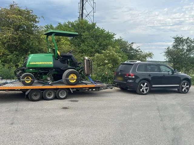 John Deere ride-on mower on the trailer